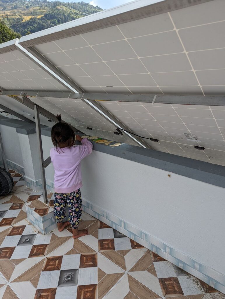 Images show the solar power currently in use at the hostel. 