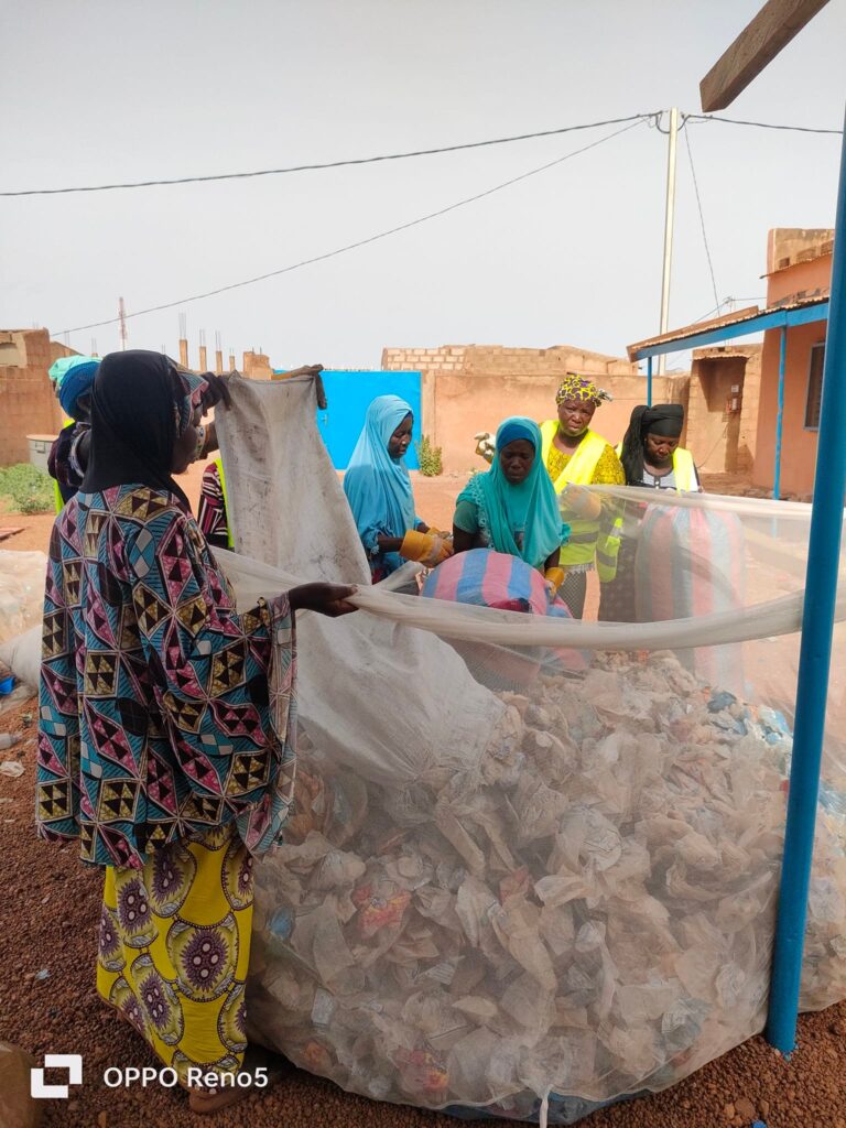 Women sorting and gathering waste